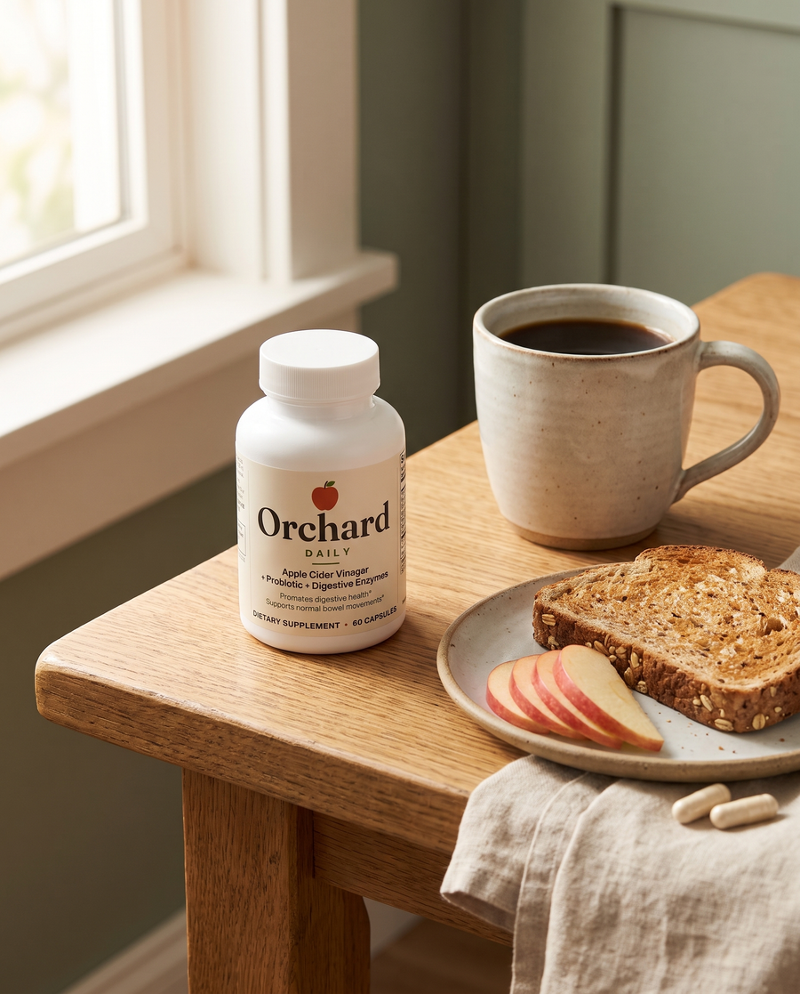 Orchard Daily bottle on a breakfast table with coffee and toast
